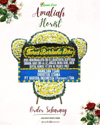 Papan Bunga Duka di Pasuluhan