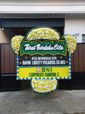 Papan Bunga Duka di Pasuluhan