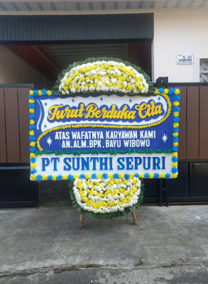 Papan Bunga Duka di Pasuluhan