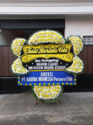 Papan Bunga Duka di Pasuluhan